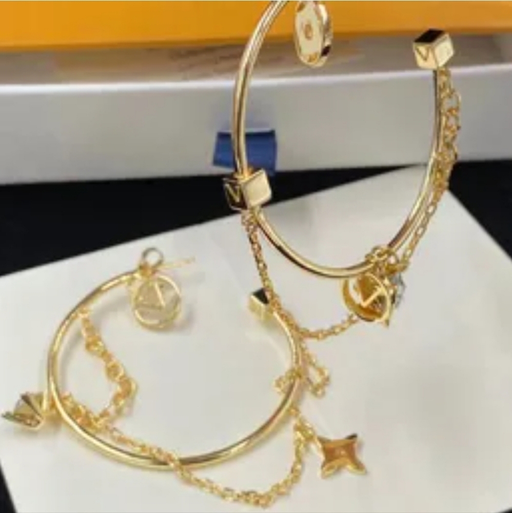Hoop LV gold earrings on sale